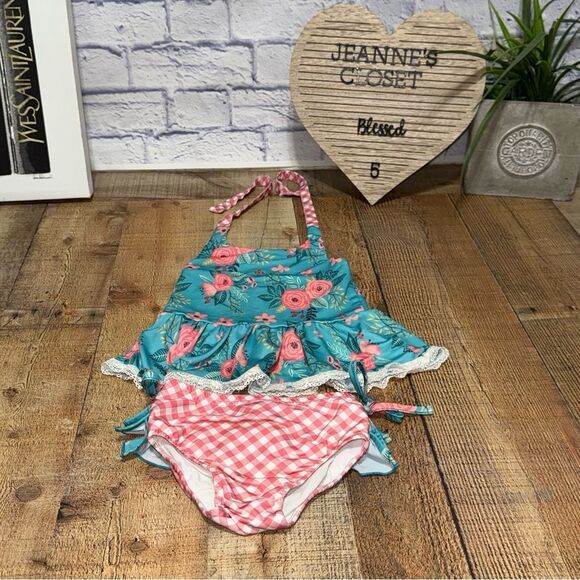 Oopsie daisy two
Piece swimsuit ruffle size 4 - Picture 4 of 10
